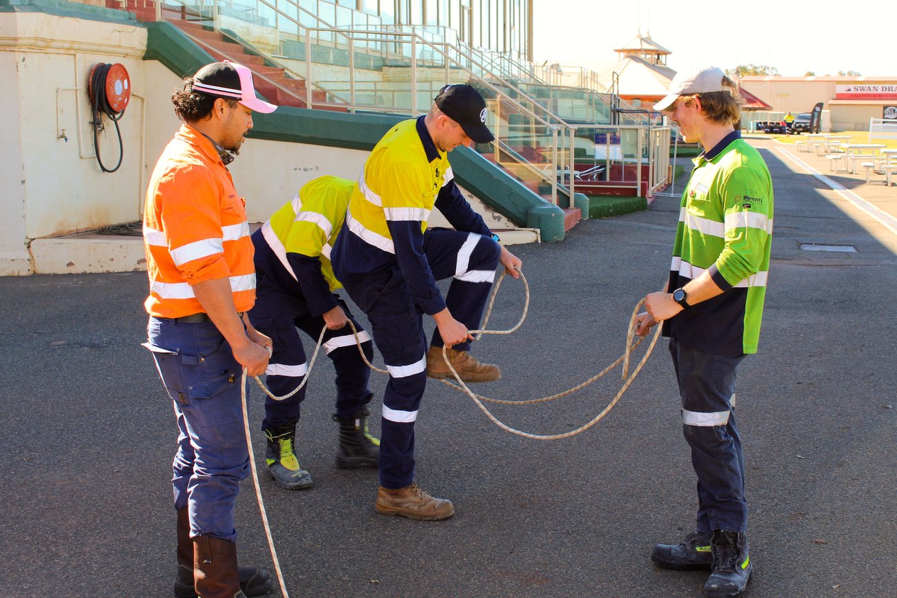 Teams practising rope rescue techniques during the Friday workshops